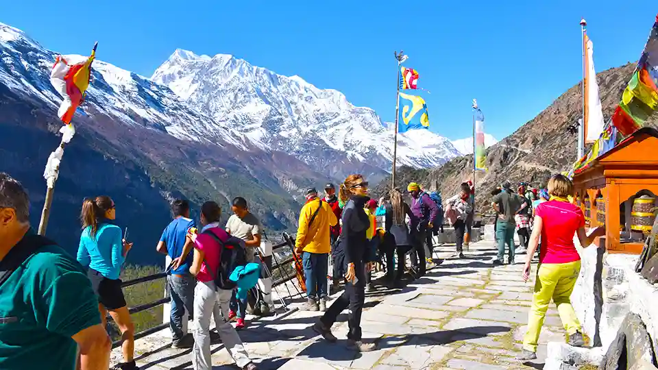trekkers in front of annapurna 3
