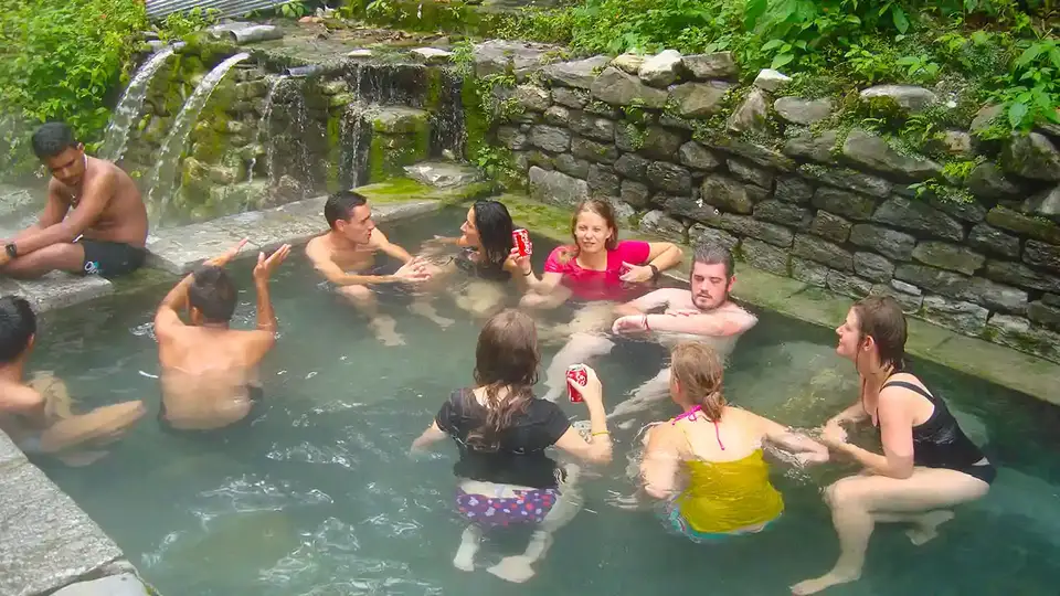 Trekkers enjoying hot spring water bath in Annapurna Base Camp