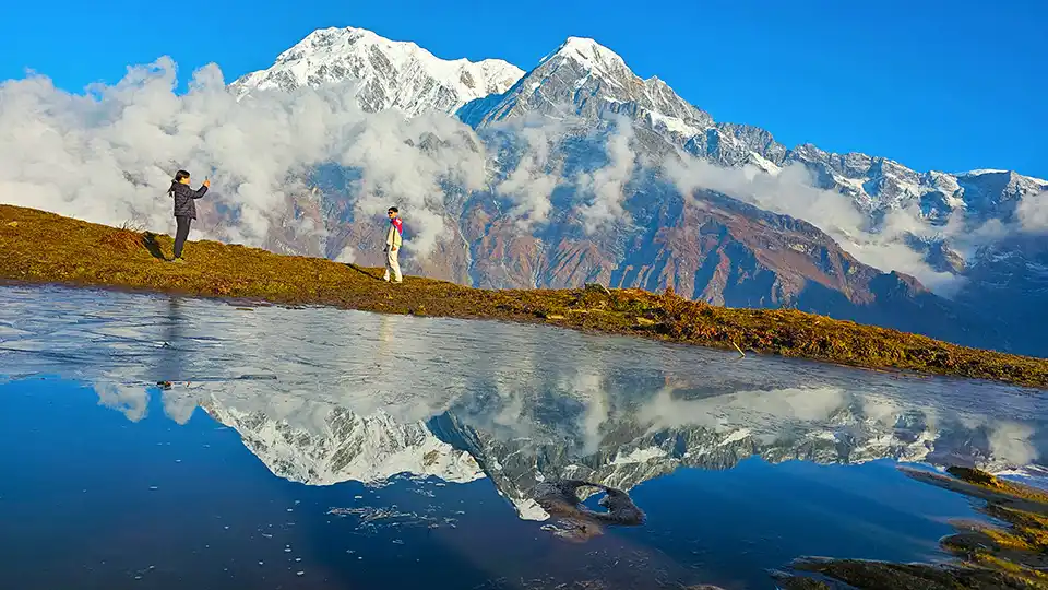 Annapurna and Hounchuli reflection on ponds during Mardi Himal Trek 5 days